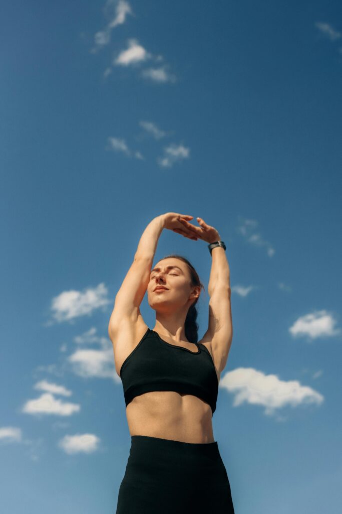 Woman practicing yoga stretch for resilience training